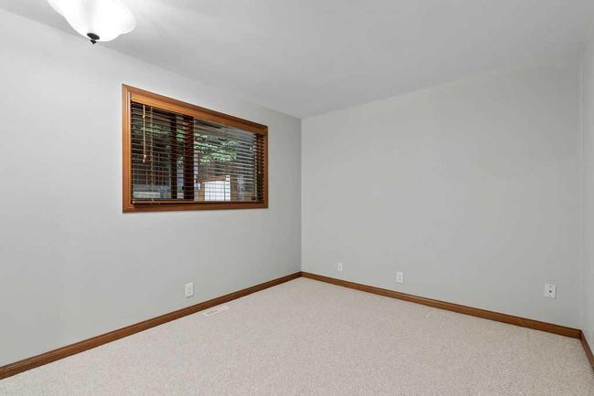 76 Coach Gate Way Sw, House other with 3 bedrooms, 2 bathrooms and 4 parking in Calgary AB | Image 23