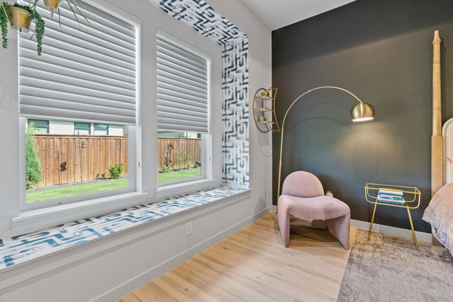 Sitting room with wood finished floors and baseboards | Image 28