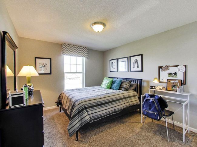 Photos are of a former model home. Actual home is under construction. | Image 18