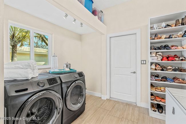 Washer and dryer in whole room closet | Image 12