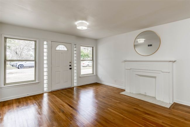 Entrance foyer with wood finished floors and baseboards | Image 27