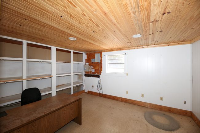 Unfurnished office with wood ceiling | Image 21