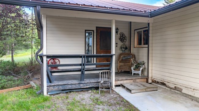 Property entrance featuring metal roof | Image 4