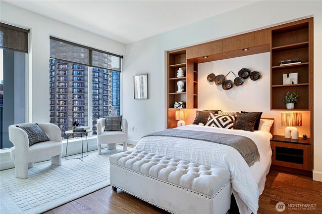 Luxurious bedroom retreat featuring a built-in, custom Murphy bed | Image 12