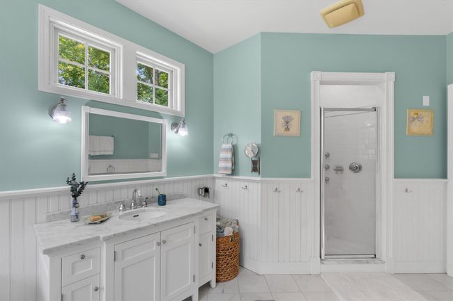 White marble Countertop vanity, wainscoting | Image 25