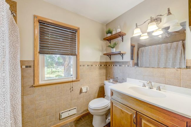 Main level full bathroom. | Image 13
