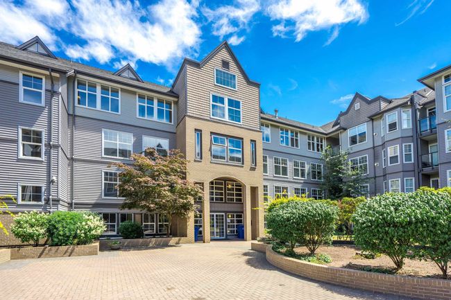 317 - 20200 56 Avenue, Condo with 2 bedrooms, 2 bathrooms and 1 parking in Langley BC | Image 1
