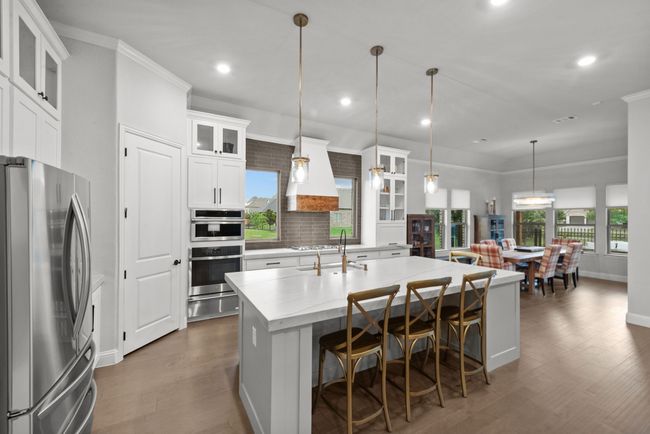 Chef's kitchen with upgraded stainless appliances | Image 15