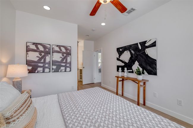 Bedroom featuring wood finished floors, recessed lighting, and a ceiling fan | Image 10