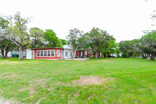 View of yard with a patio | Image 11