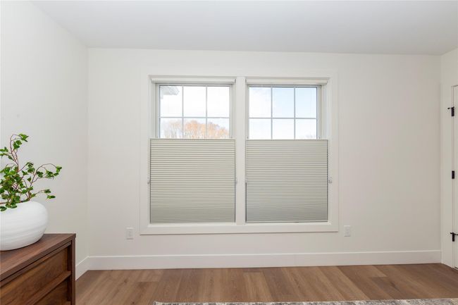 All bedrooms feature room darkening Hunter Douglas top-down, bottom-up shades. | Image 29