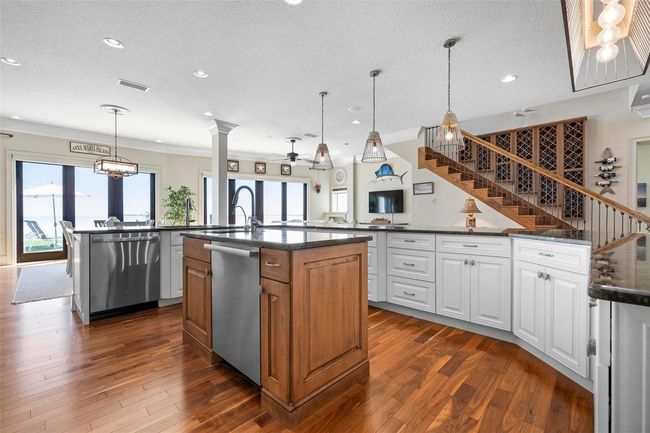 Kitchen featuring two dishwashers | Image 32