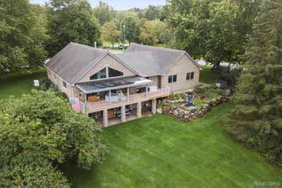 7477 Ore Knob Drive, Home with 3 bedrooms, 3 bathrooms and null parking in Tyrone Twp MI | Image 2