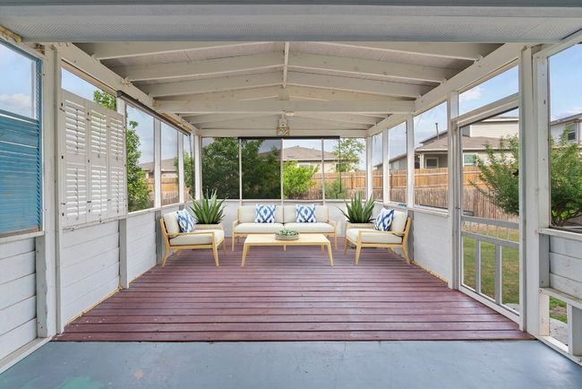 Sunroom with an outdoor living space and a wealth of natural light | Image 18
