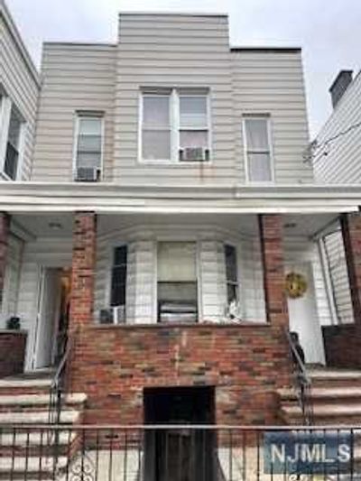 16 Irving Street, Home with 6 bedrooms, 2 bathrooms and null parking in Jersey City NJ | Image 1