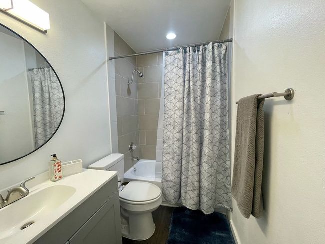 Full bathroom featuring vanity and shower / tub combo | Image 12