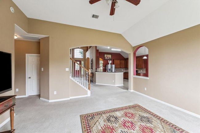 View from the family room toward the kitchen and foyer | Image 5