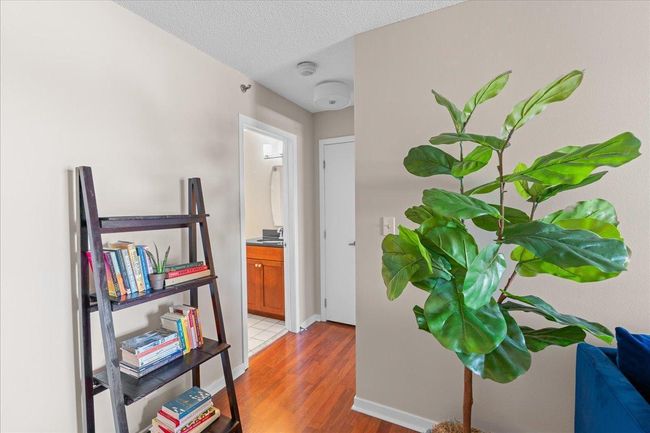Hall to bathroom, linen closet and bedroom | Image 7