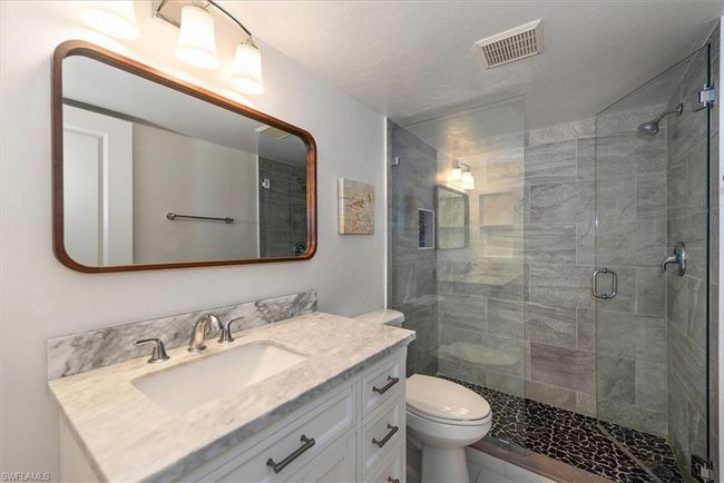 Full bath with vanity and a stall shower | Image 22