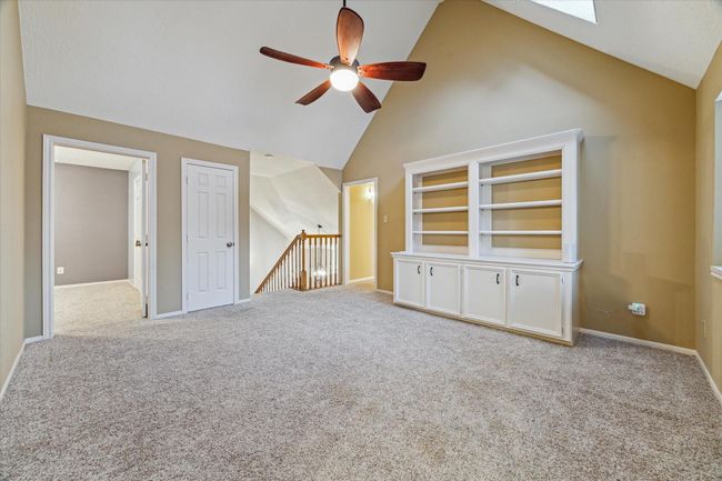 The den also includes built-ins and additional closet. | Image 25