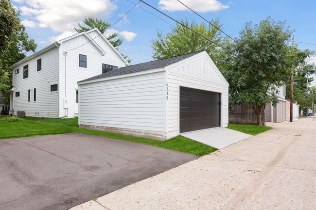 New two car garage. Pictures of previously built house. | Image 28