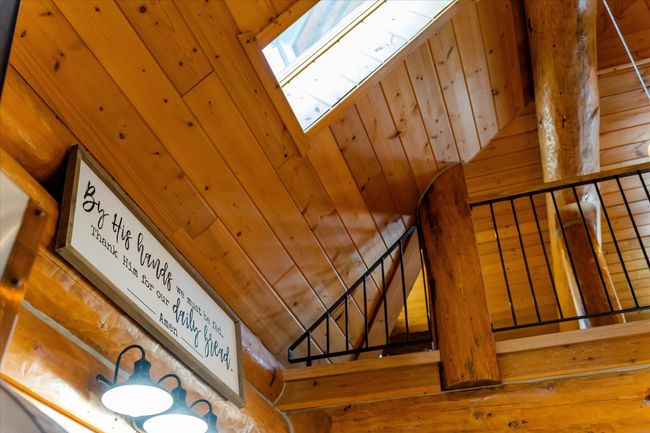 Open ceiling area above kitchen. | Image 34
