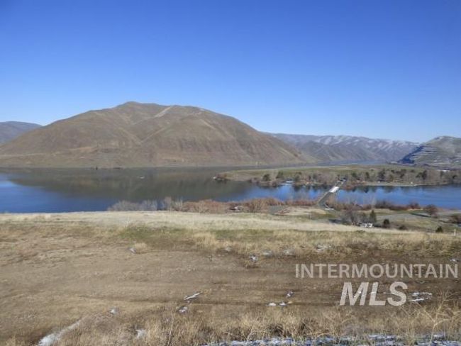 View of mountain background featuring a large body of water | Image 40