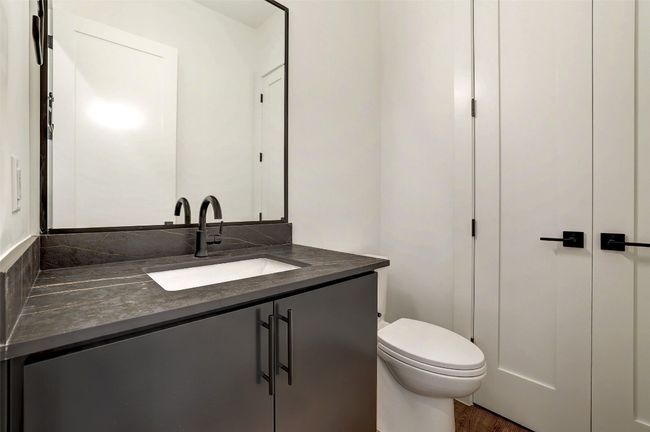 Half bath featuring vanity and toilet | Image 5