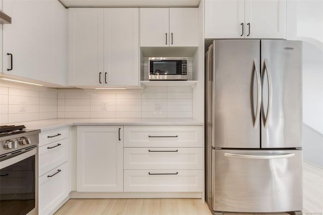 Beautiful kitchen with stainless steel appliances | Image 31