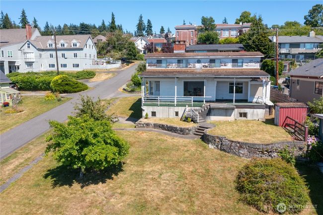 The foundation is there to either fully remodel and update or remove the house and start over with your own custom design and vision. Just a couple blocks down from Lowell Elementary. | Image 9