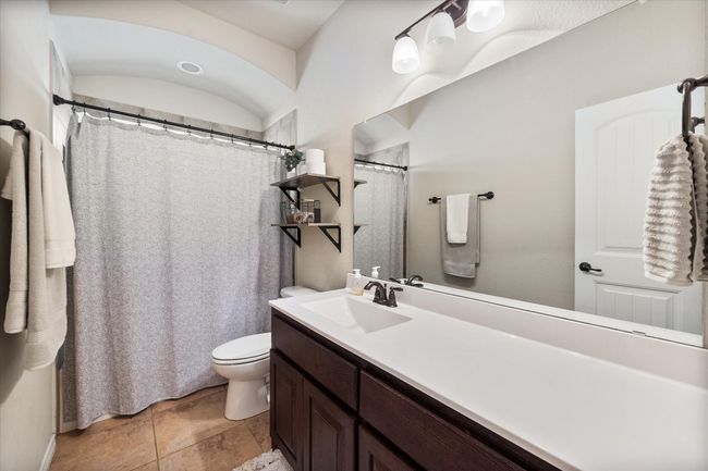 Bathroom with toilet and vanity | Image 30