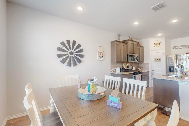 Dining room featuring recessed lighting, visible vents, and baseboards | Image 5