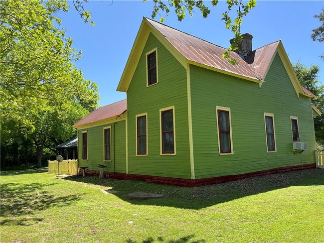 Back and side of home yard, metal roof | Image 4