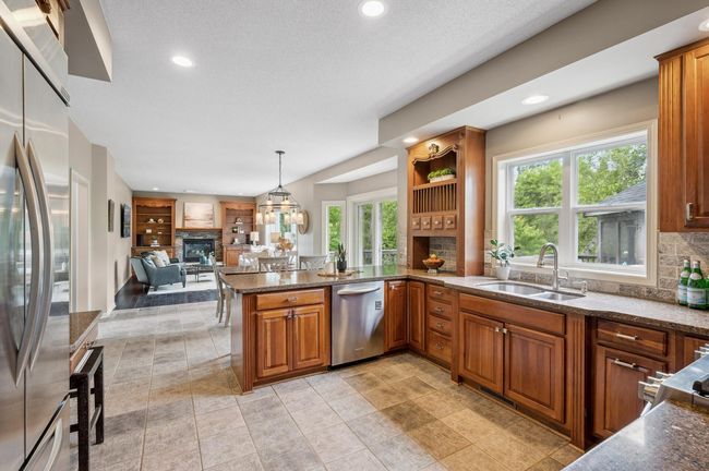 Kitchen through to informal dining and living room - everyone can gather! | Image 10