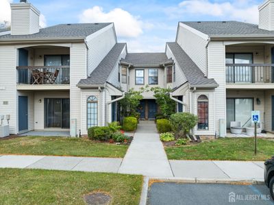 1006 Harbor Club Drive, Townhouse with 2 bedrooms, 2 bathrooms and null parking in Sayreville NJ | Image 1