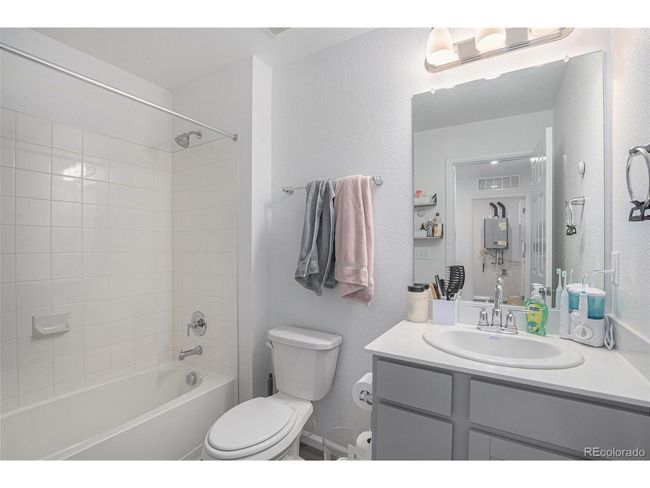 20932 E 60 Th Ave, Townhouse with 3 bedrooms, 3 bathrooms and null parking in Aurora CO | Image 20