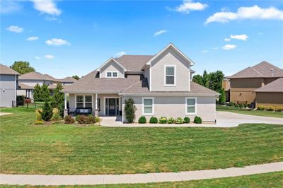 View of front of home featuring a large front lawn | Image 1