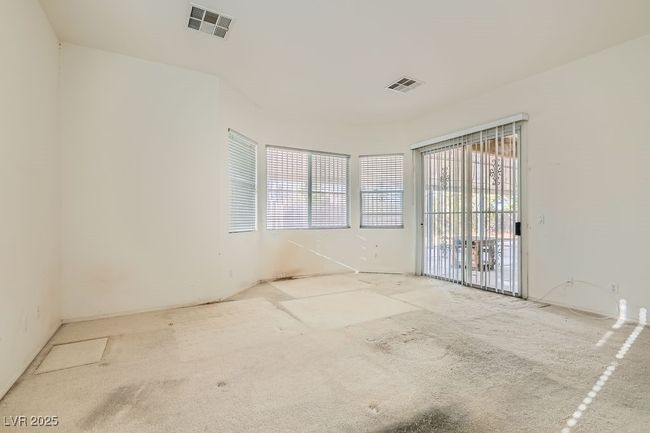 Spare room with visible vents and carpet floors | Image 16