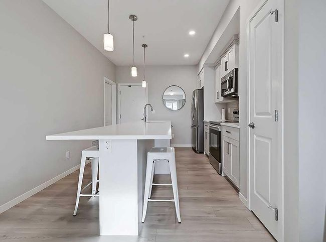 318 - 4350 Seton Dr Se, Condo with 1 bedrooms, 1 bathrooms and 1 parking in Calgary AB | Image 8