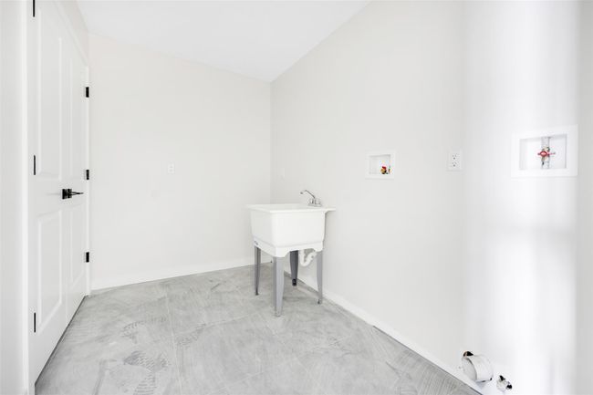 Washroom featuring washer hookup | Image 42