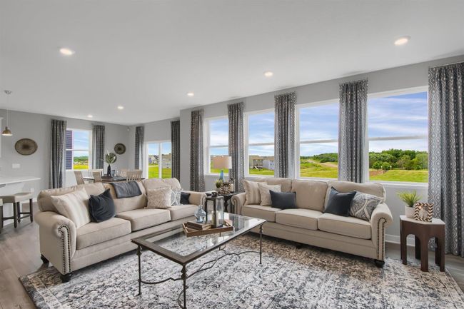 Spacious family room with plenty of natural light. Model photos. Options and colors will vary. | Image 12