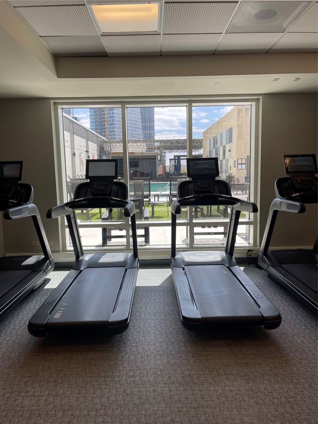 Exercise room with carpet floors | Image 14