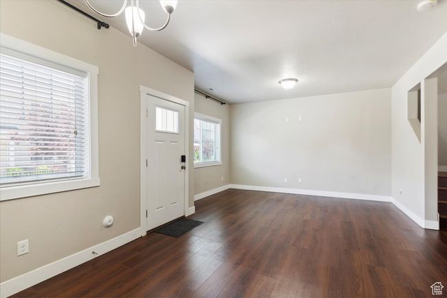 Entrance foyer with dark wood finished floors and baseboards | Image 7