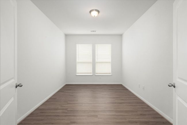 Office with double doors off the main entry hallway | Image 19