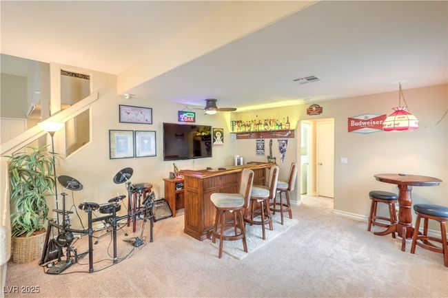 Indoor wet bar with carpet | Image 21