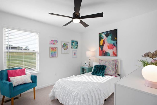 Bedroom featuring carpet floors and ceiling fan | Image 25