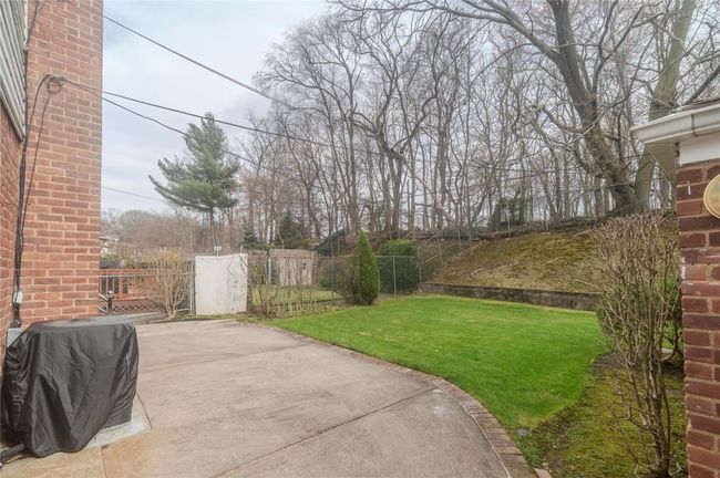 View of yard featuring a patio and fence | Image 30
