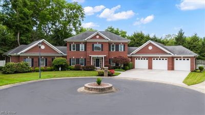 View of the expansive all brick custom designed/built home. | Image 1