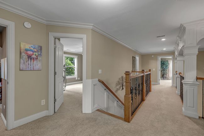 A grand view of the second-floor hallway. | Image 29