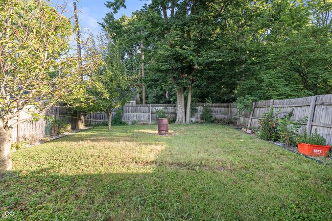 view of fenced backyard | Image 54